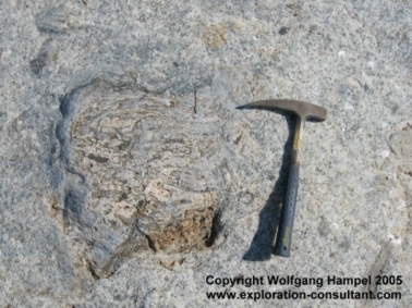 Scapolitite-enclave with pyroxene-rich reaction rim in marble, (French cipolin)  from an outcrop near Besa-Esiva.